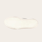 Zapatilla OLKI Real negra con planta blanca de plataforma y cordones, ideal para uso diario.