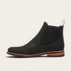 Botín chelsea negro de cuero para hombre OLKI con elásticos laterales y suela de cuero.
