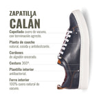 Zapatilla Calán de cuero azul marino de OLKI con cordones de algodón encerado y planta de caucho blanca. Diseño artesanal.