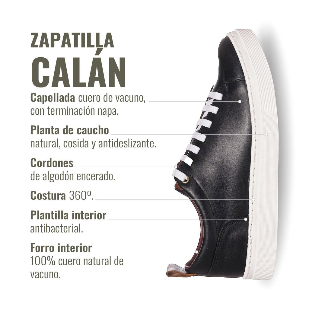 Zapatilla Calán negra de cuero de vacuno con cordones de algodón encerado y planta de caucho antideslizante. OLKI