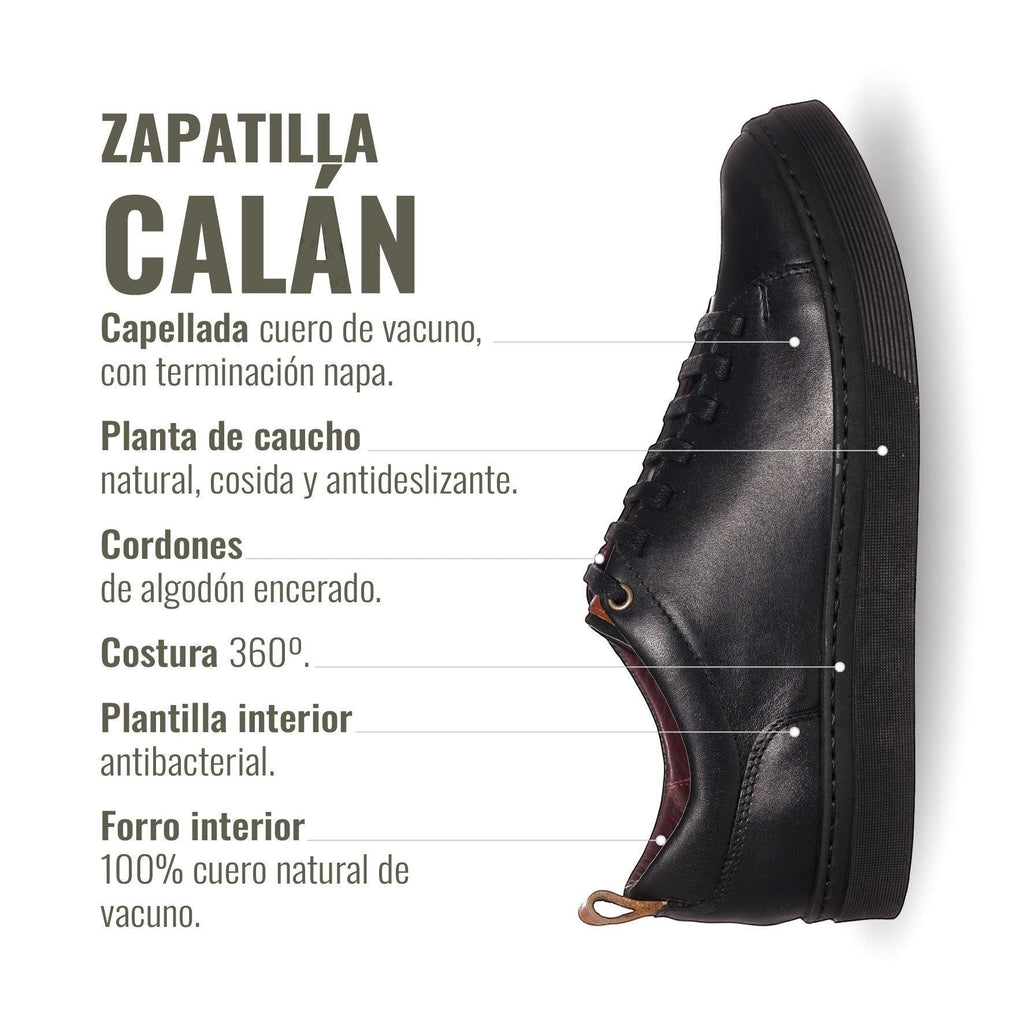 Zapatilla Calán negra de cuero de vacuno con cordones de algodón encerado y planta de caucho antideslizante. OLKI.