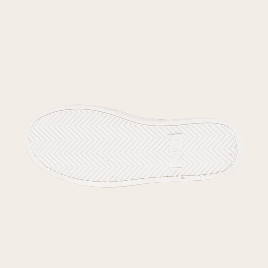 OLKI Zapatilla Calán verde musgo con planta blanca de goma y diseño de espiga. Ideal para uso diario.