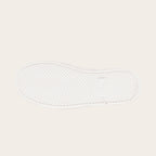 OLKI Zapatilla Calán verde musgo con planta blanca de goma y diseño de espiga. Ideal para uso diario.