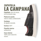 Zapatilla OLKI La Campana negra de cuero con planta blanca. Diseño urbano y minimalista con cordones de algodón encerado.