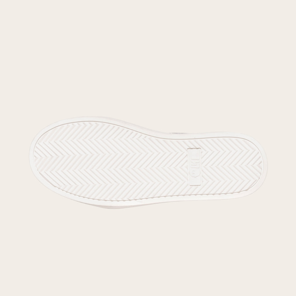 Zapatilla OLKI Manquehue petroleo de cuero con cordones blancos y planta de caucho blanca. Diseño urbano.