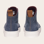 Zapatilla OLKI Manquehue petroleo de cuero con cordones blancos y planta de caucho blanca. Diseño urbano.