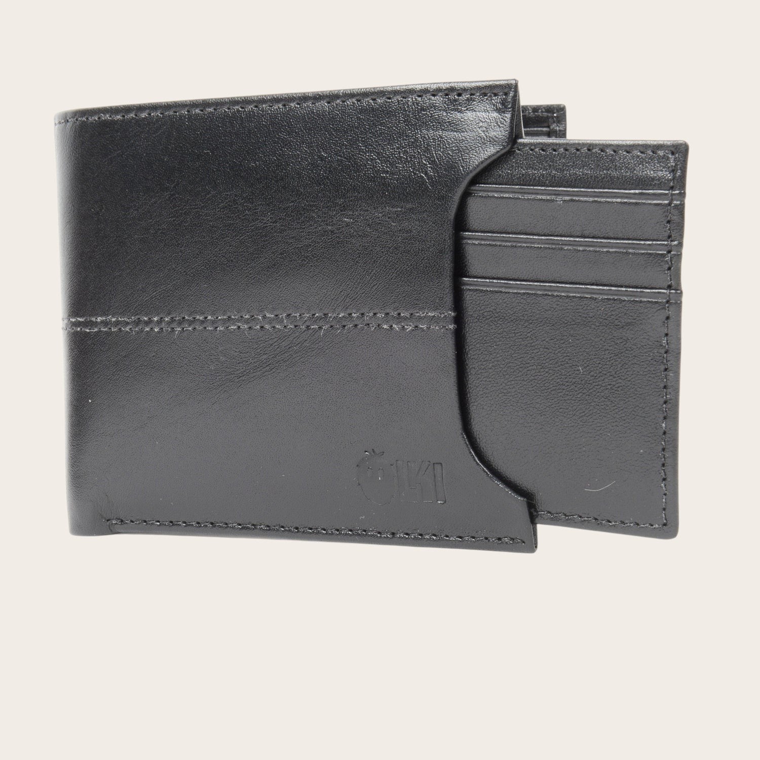 Billetera OLKI Ancoa Negro de cuero con múltiples compartimentos para tarjetas y billetes. Diseño minimalista con costuras reforzadas y logo grabado.