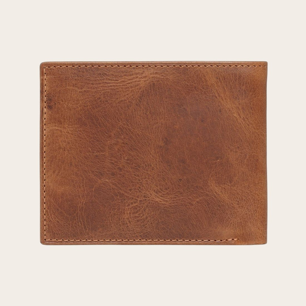 Billetera OLKI Ñuble Habano de cuero marrón con costuras visibles y textura natural. Diseño plegable con múltiples ranuras para tarjetas.