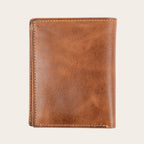 Billetera vertical OLKI Maule Habano de cuero genuino en color marrón con costuras visibles y diseño minimalista.