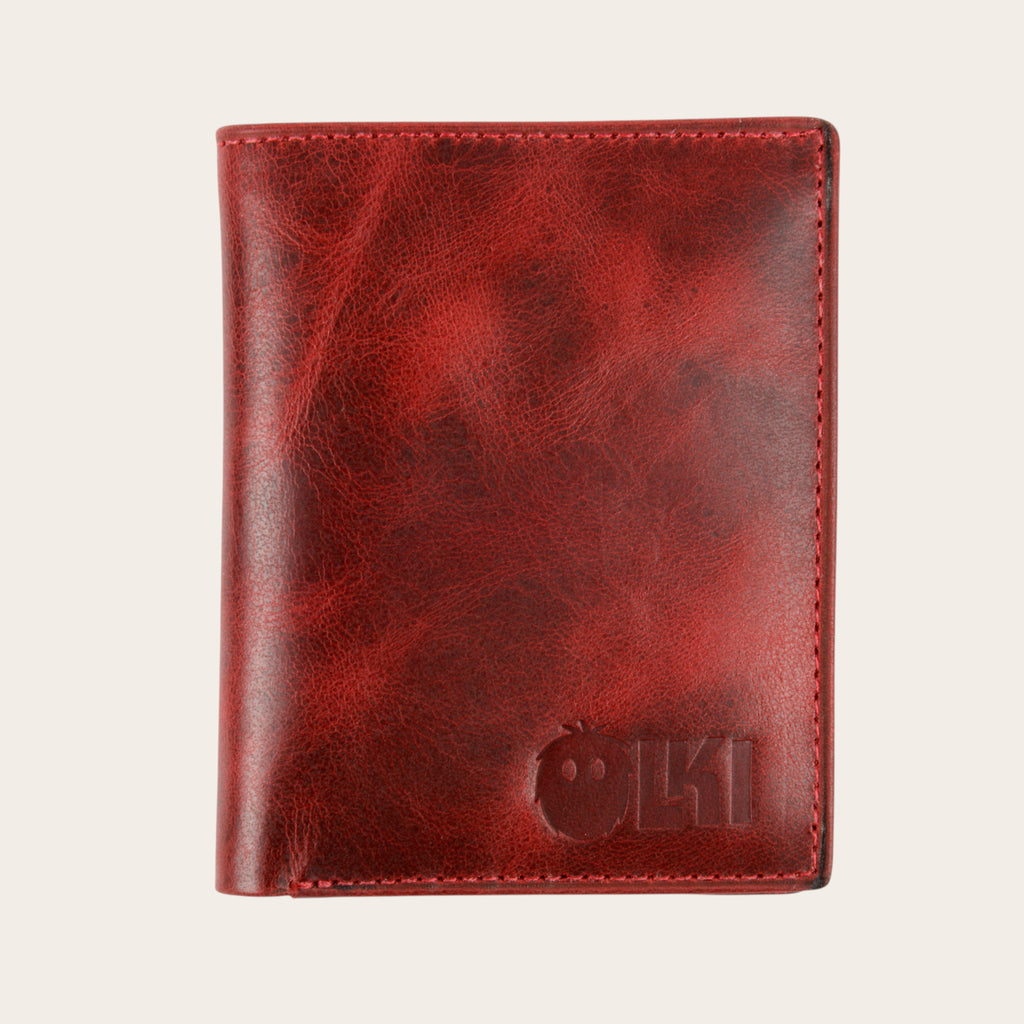 Billetera vertical OLKI roja de cuero de vacuno con 6 espacios para tarjetas y separador de billetes.