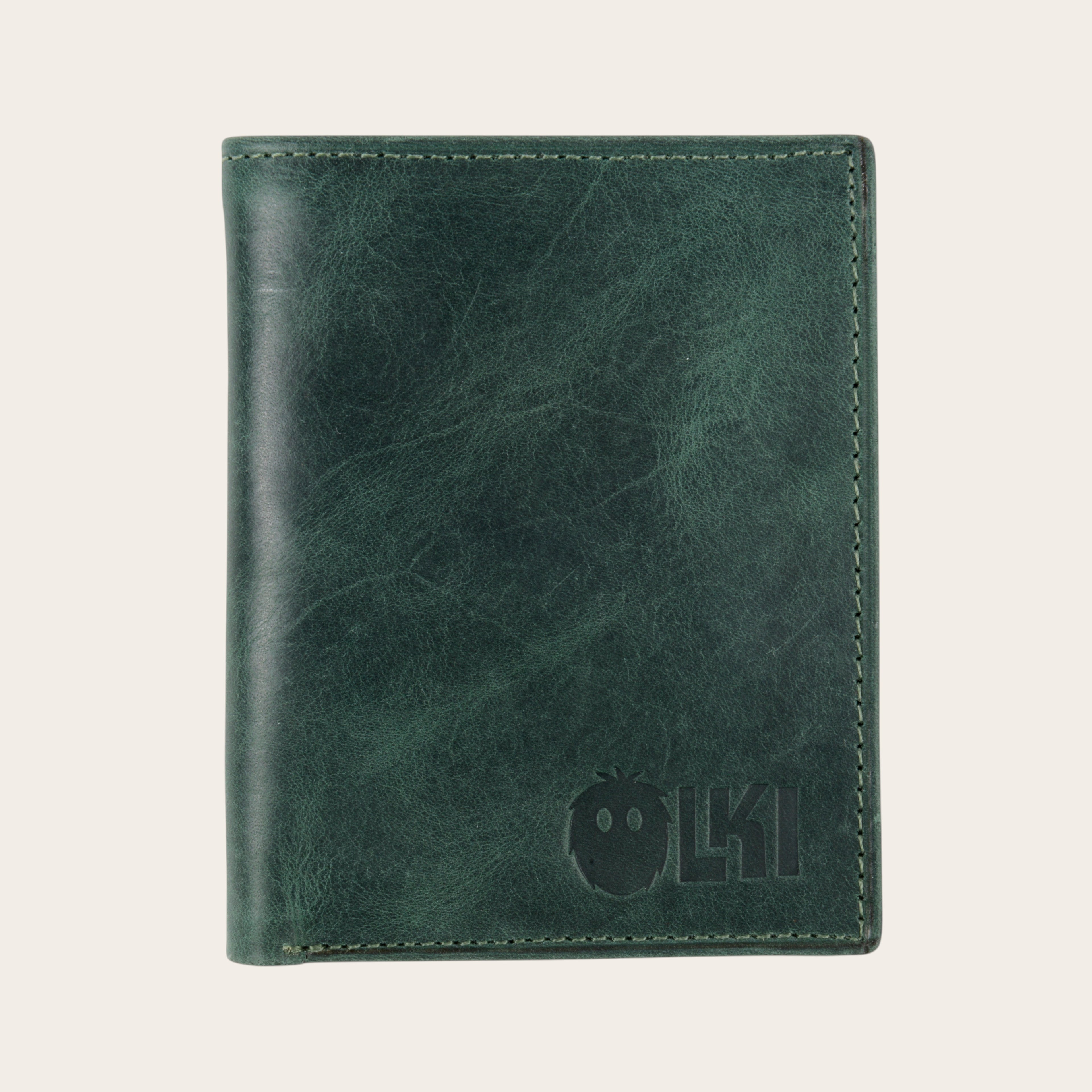 Billetera vertical OLKI verde de cuero de vacuno con 6 espacios para tarjetas y separador de billetes.
