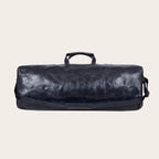 Bolso de fin de semana OLKI azul marino de cuero con asas y correa de hombro ajustable.