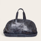 Bolso de viaje OLKI Baker azul marino de cuero con asas superiores. Diseño clásico tipo barril.