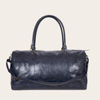 Bolso de viaje OLKI Futaleufu azul marino de cuero desgastado con asas superiores y correa de hombro ajustable.