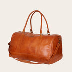 Bolso de viaje OLKI Futaleufu Curry de cuero natural de vacuno con correa ajustable y costuras reforzadas. 45 litros.