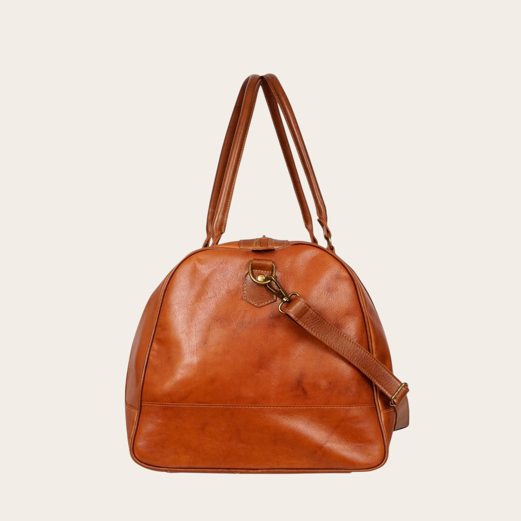 Bolso de viaje OLKI Futaleufu Curry Combinado de cuero con asas y correa ajustable. Ideal para escapadas.