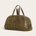 Bolso de viaje OLKI Baker en cuero verde con asas resistentes y diseño espacioso para escapadas de fin de semana