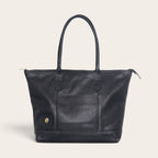 Cartera de hombro OLKI Tulipán en cuero graso negro con textura marcada, asas largas y cierre superior seguro.