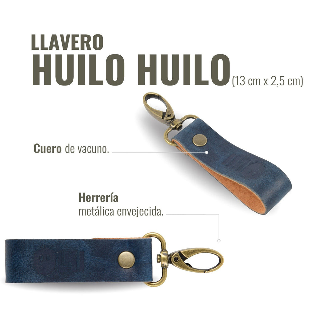 Llavero OLKI Huilo Huilo azul marino de cuero con herrajes metálicos envejecidos y mosquetón.