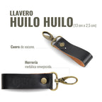 Llavero OLKI Huilo Huilo negro de cuero de vacuno con herrería metálica envejecida y mosquetón. Medidas 13x2,5 cm.