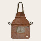 Pechera de cuero natural OLKI modelo Colbún en color café habano con bolsillo frontal y correas ajustables.