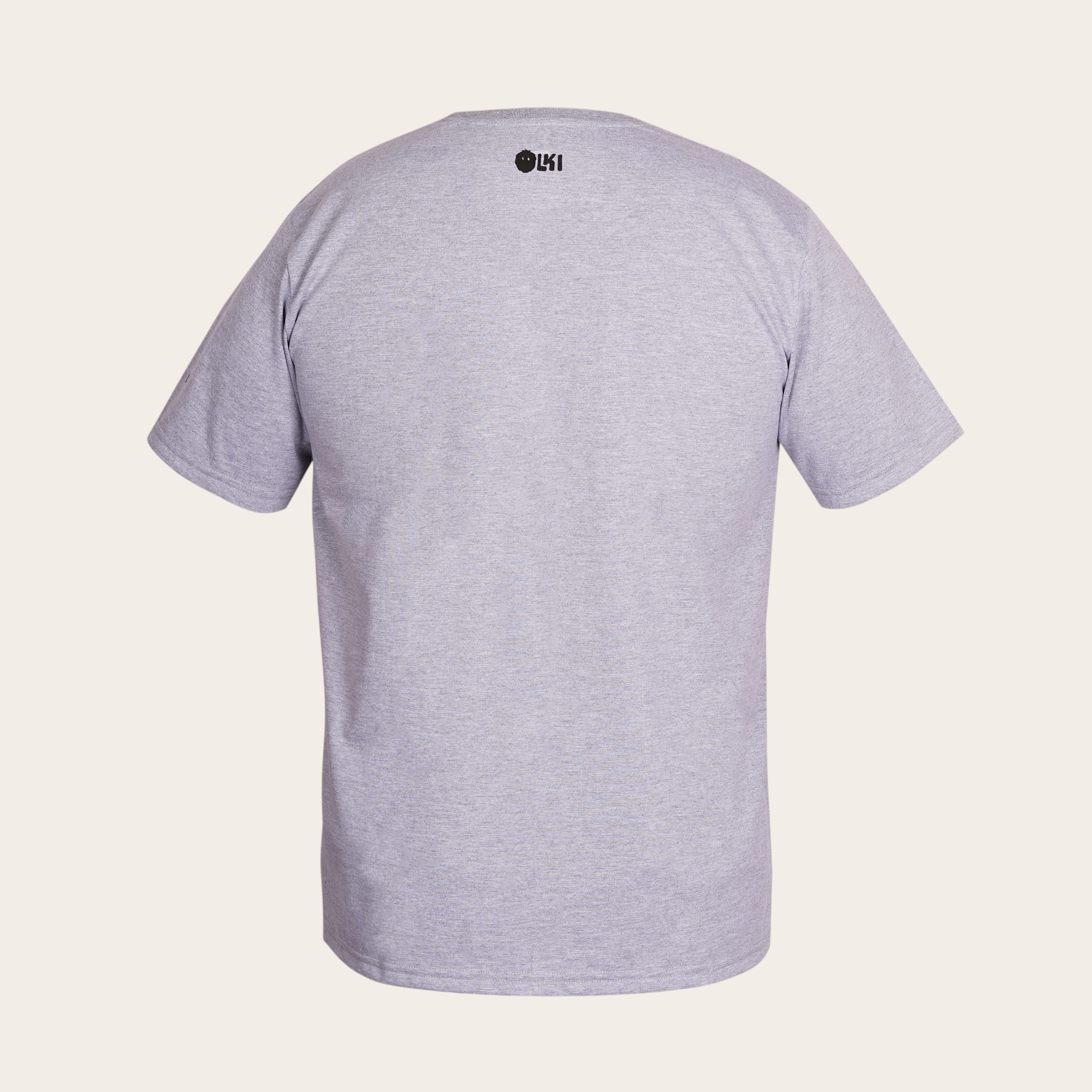 Polera gris de manga corta OLKI 100% algodón peruano premium con logo discreto en la nuca.