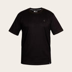 Polera negra de manga corta OLKI 100% algodón peruano premium con logo discreto en el pecho y cuello.
