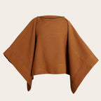 Poncho OLKI de lana premium color castaño liso, tejido compacto y duradero, ideal para climas fríos.