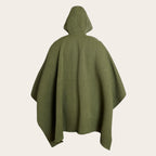 Poncho clásico OLKI de lana premium verde con capucha. Diseño amplio y atemporal, tejido en telar.