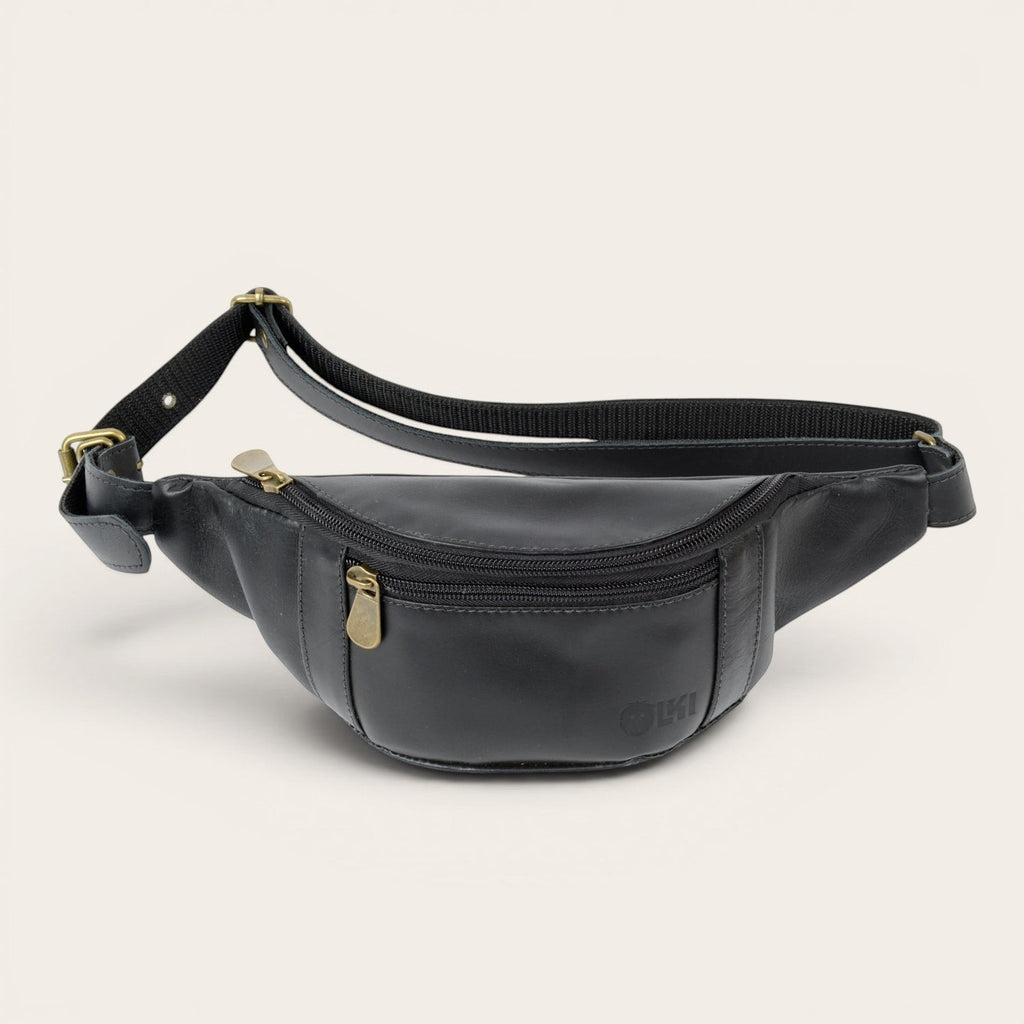 Banano negro de cuero de OLKI con bolsillo frontal y correa ajustable, ideal para viajes y uso diario.