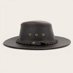 Sombrero de cuero marrón oscuro OLKI Pumalín con ala ancha, cinta trenzada y remaches metálicos.