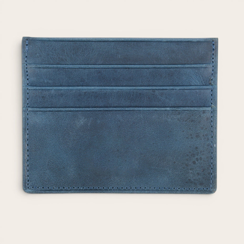 Tarjetero Rapel Azul de piel de OLKI con múltiples ranuras para tarjetas, diseño minimalista y elegante.