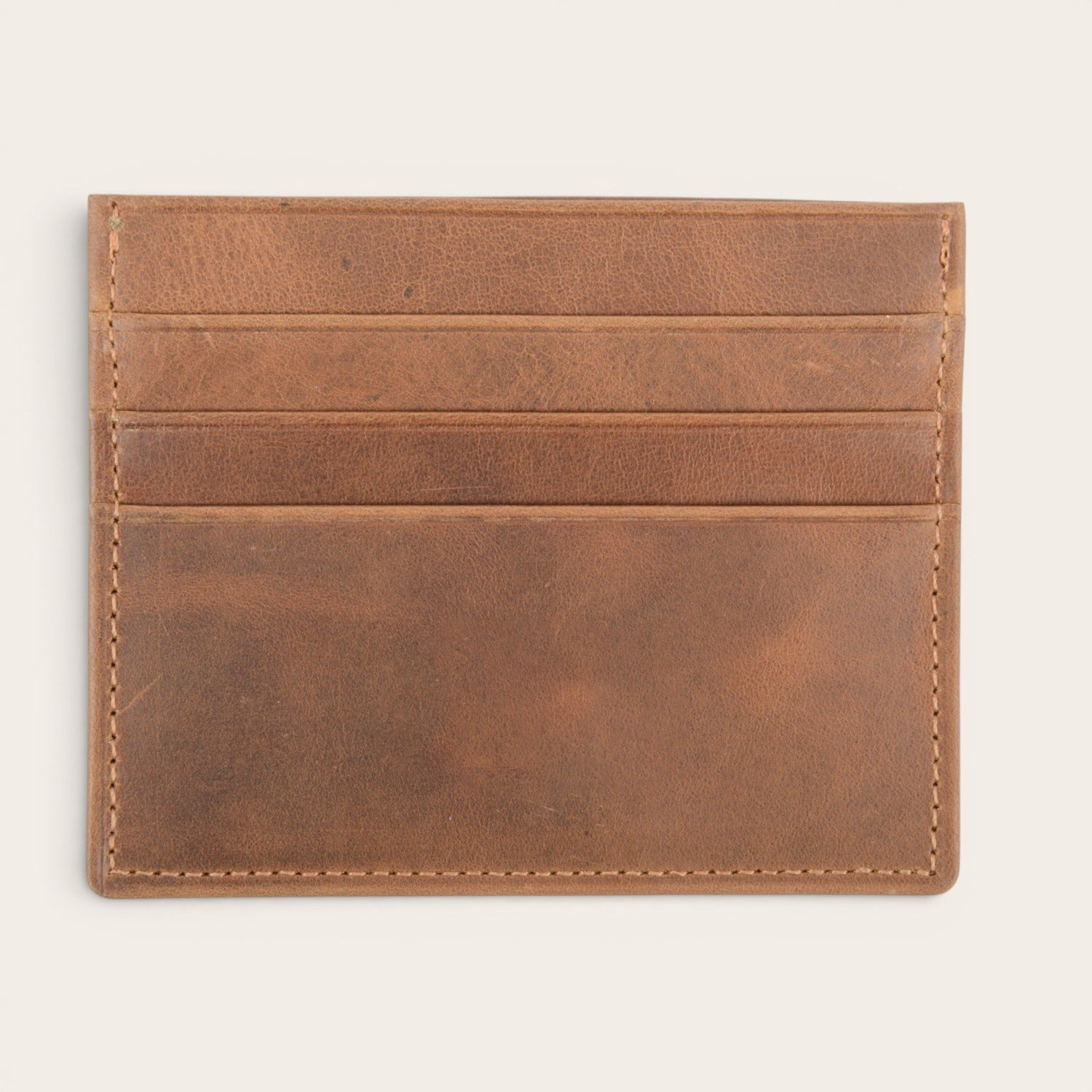 Tarjetero Rapel Habano de piel marrón de OLKI con múltiples ranuras para tarjetas. Diseño minimalista y elegante.