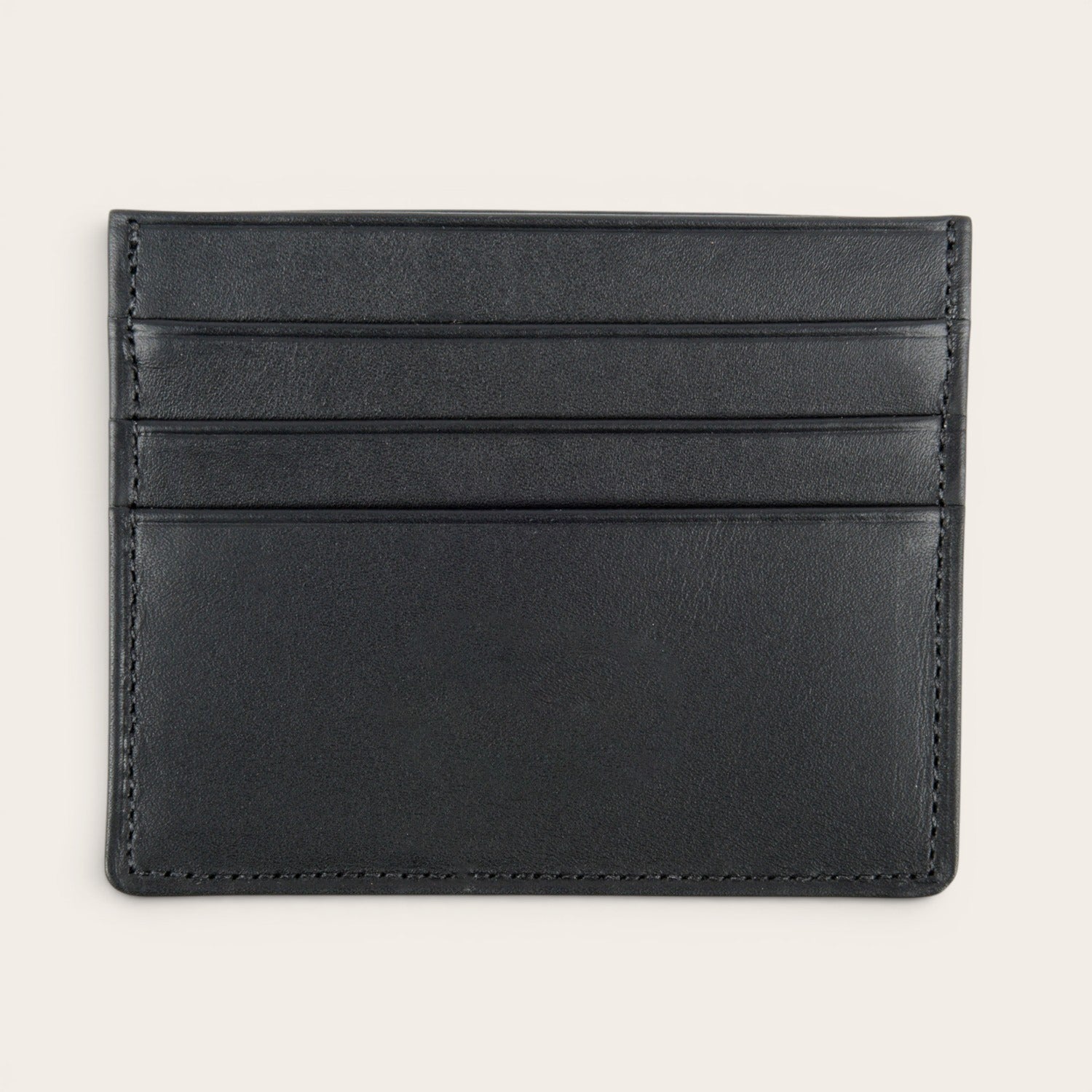 OLKI Tarjetero Rapel Negro de cuero con múltiples ranuras para tarjetas.