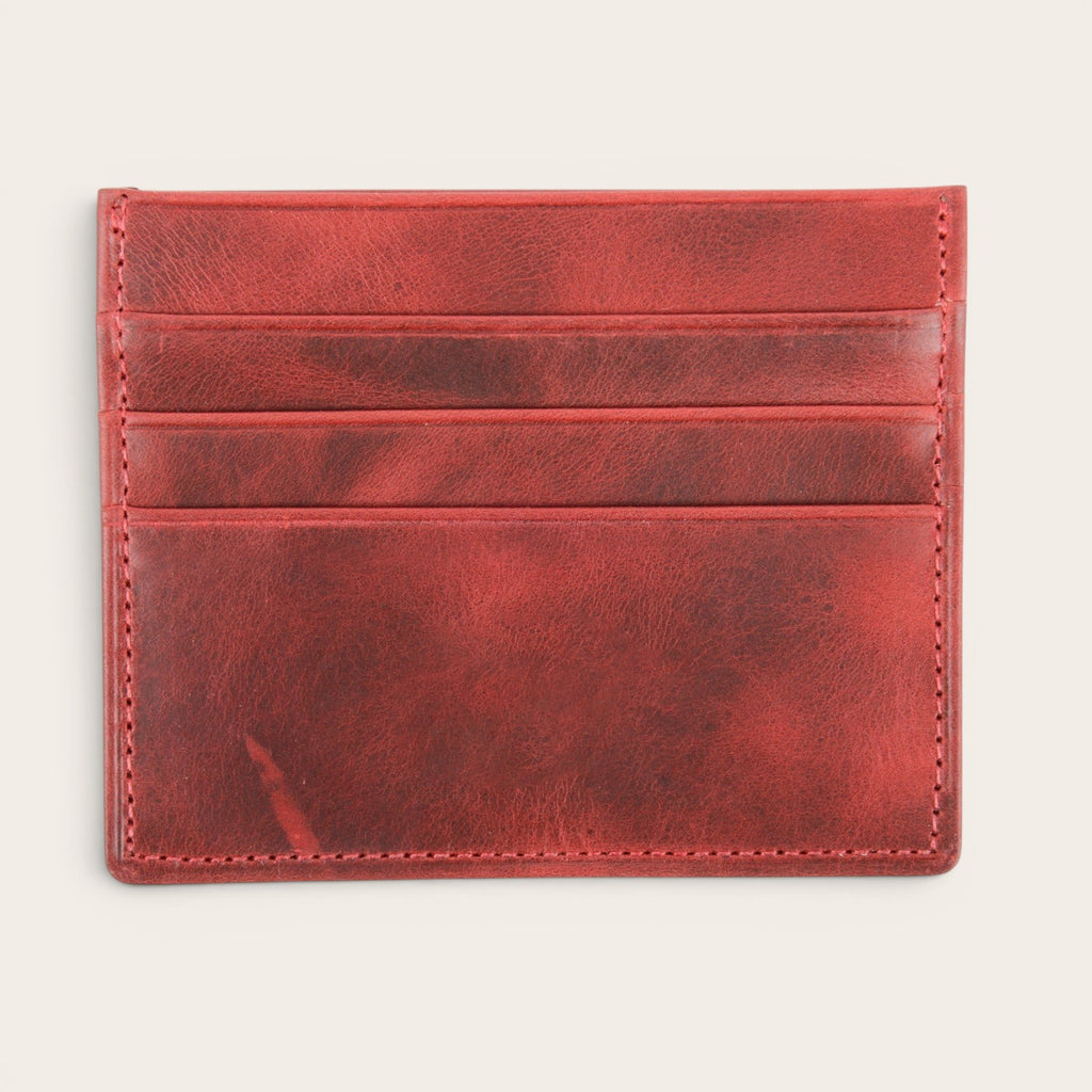 Tarjetero Rapel Rojo de cuero con acabado desgastado y múltiples ranuras para tarjetas de OLKI.
